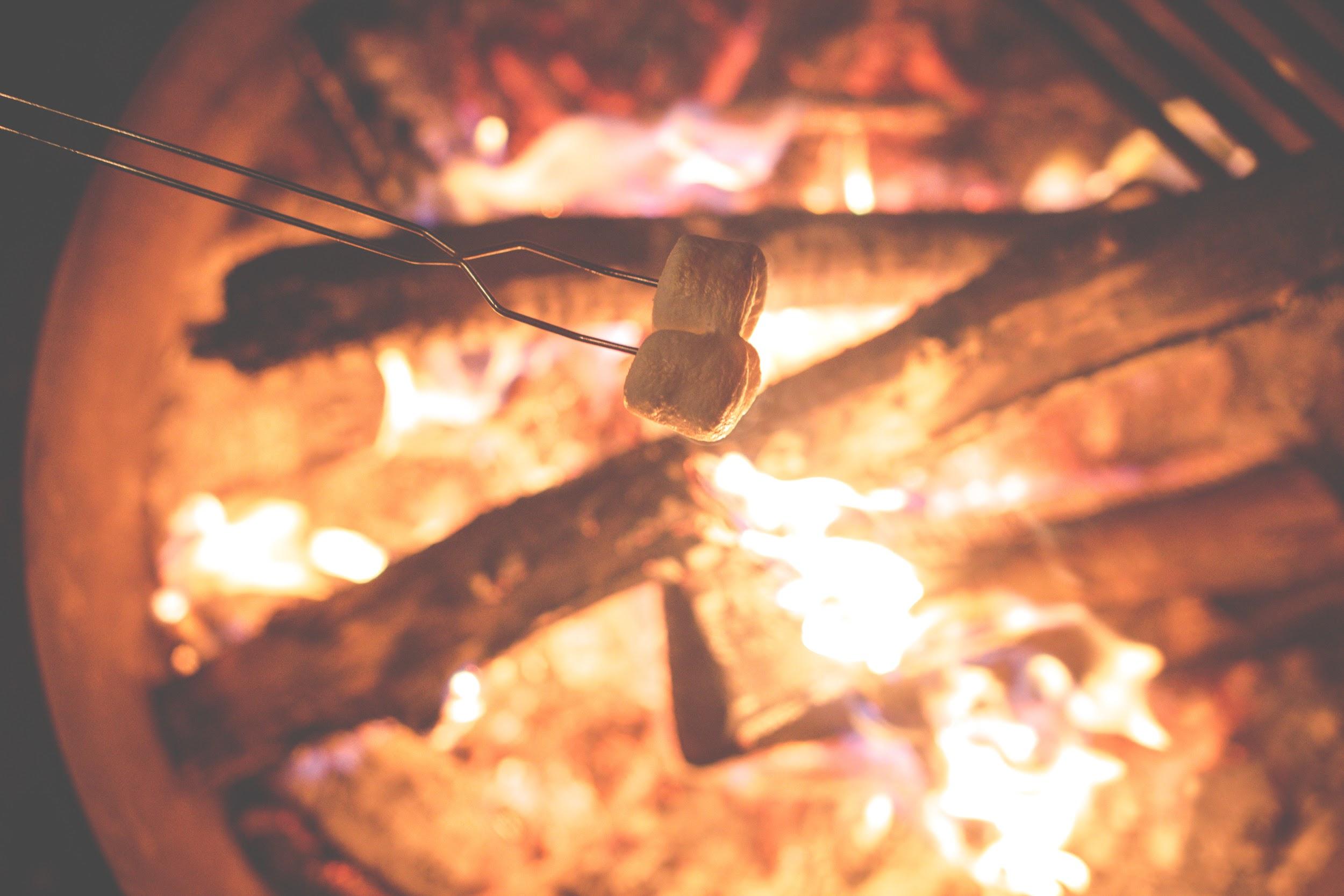 Top 5 Ways You Can Improve Your Outdoor Space campfire marshmellow